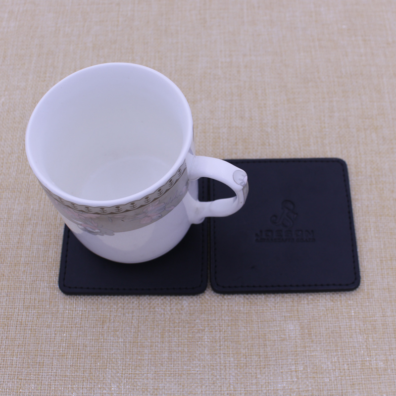 China Supply Cheapest Logo Debossed Black PU Leather Coaster