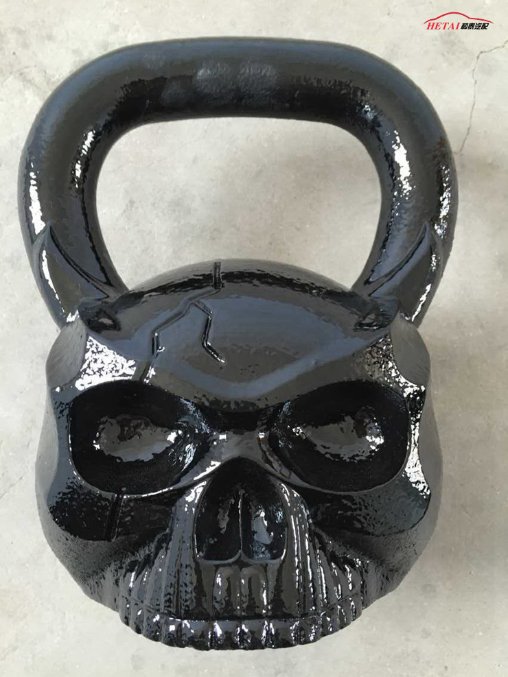 Casting Iron Customized OEM Sculpted Ape Skull Shaped Kettlebell with Face