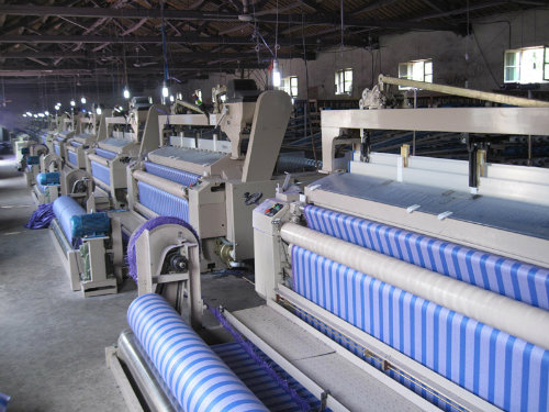 China Hot Sale Uw918 Plastic Weaving Water Jet Loom for Tarpaulin Fabric Weaving Machine