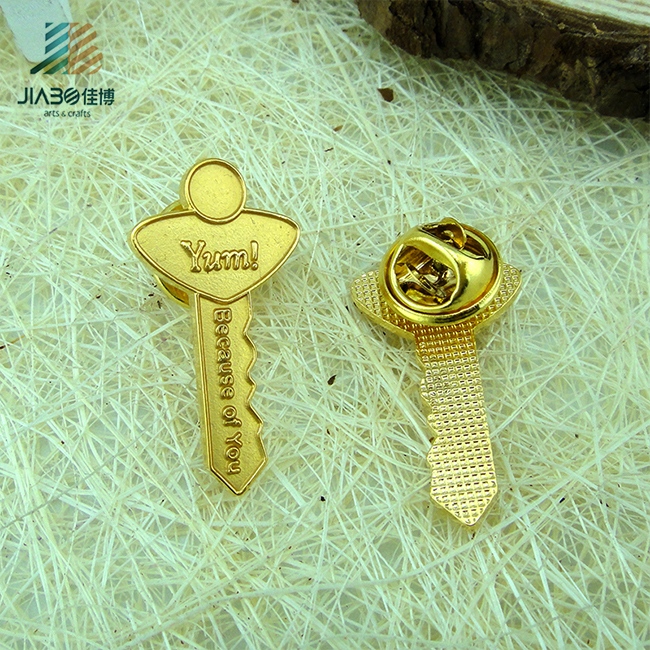 Custom Designed Die Struck Matt Gold Key Shape Pin Badge