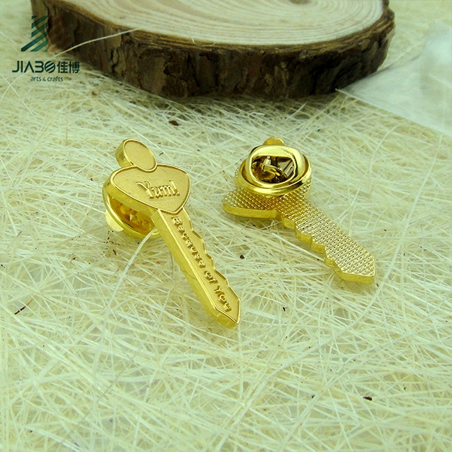 Custom Designed Die Struck Matt Gold Key Shape Pin Badge