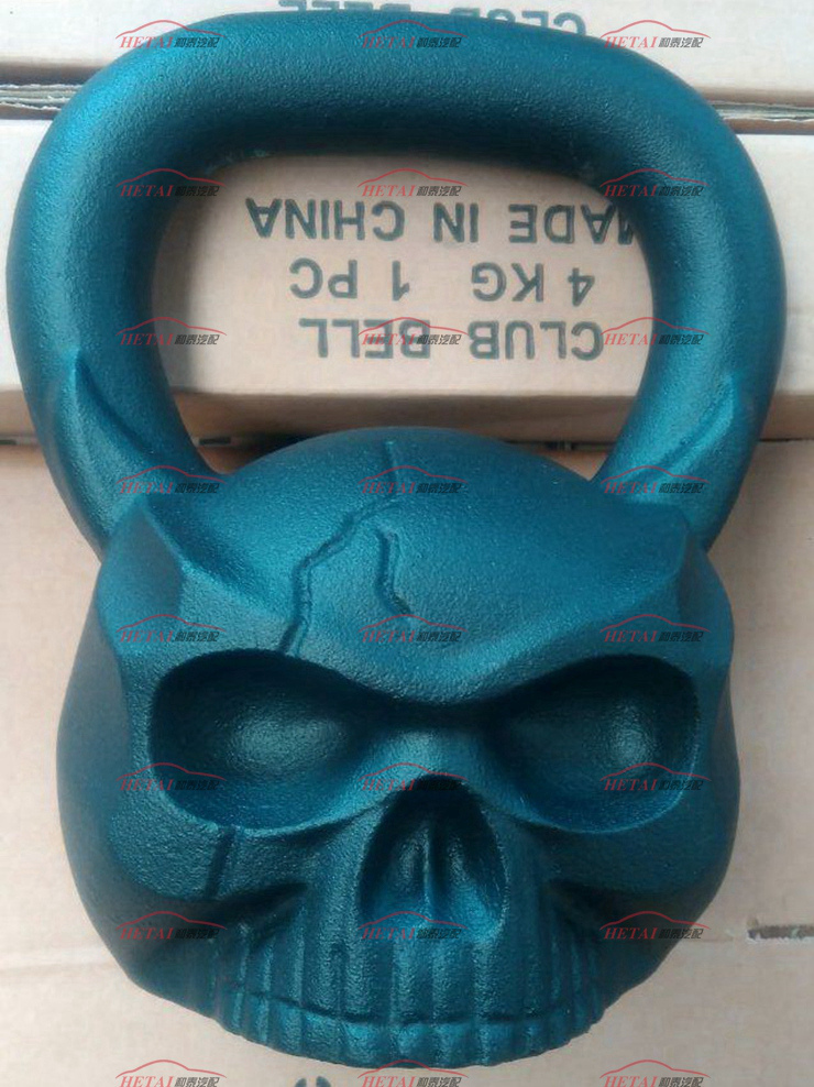 Casting Iron Customized OEM Sculpted Ape Skull Shaped Kettlebell with Face