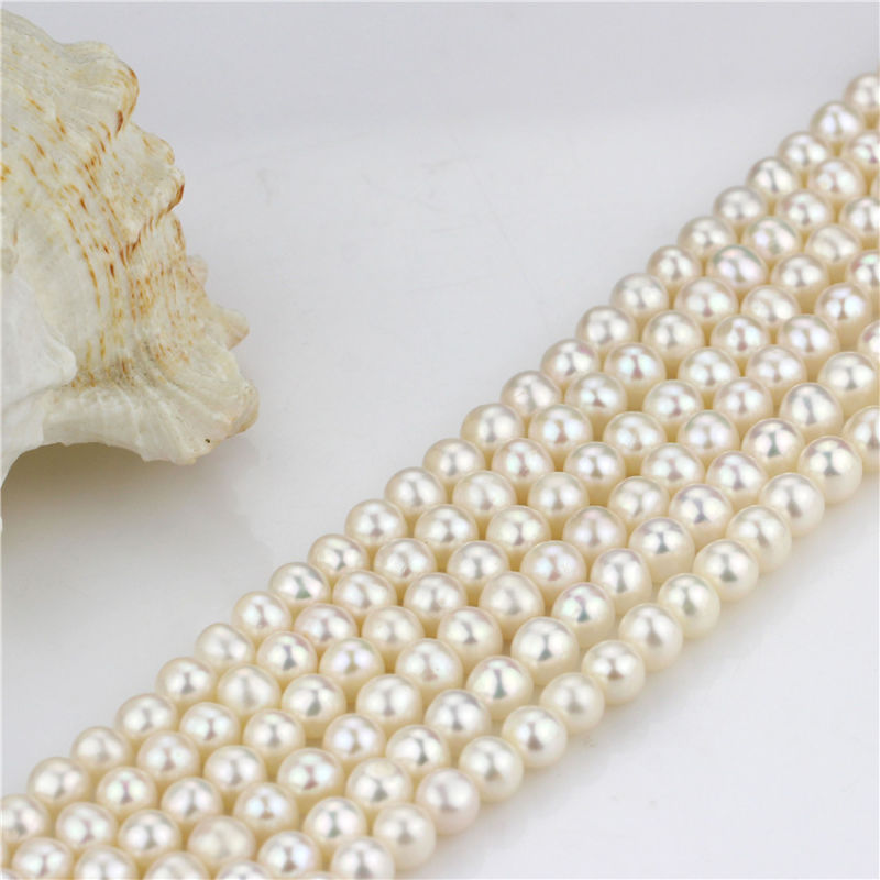 Size 7mm Freshwater Near Round Loose Strand Grade AA White Color Genuine Pearl String