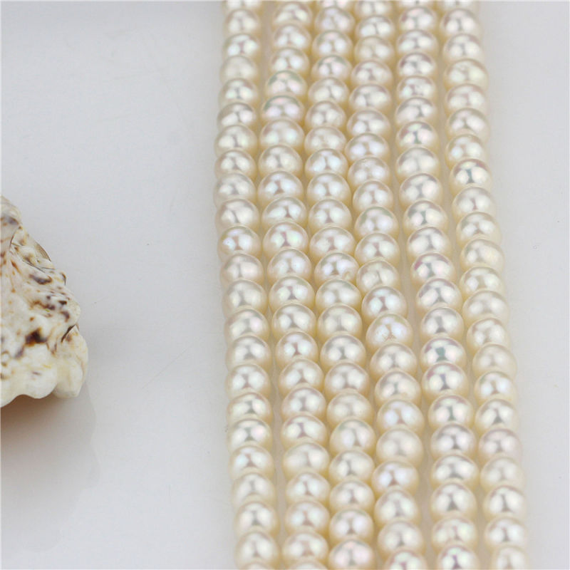 Size 7mm Freshwater Near Round Loose Strand Grade AA White Color Genuine Pearl String