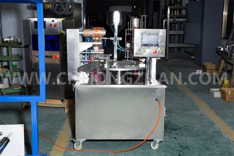 Hongzhan Kis900 Automatic Rotary Type Cup Filling and Sealing Machine for Juic or Coffee