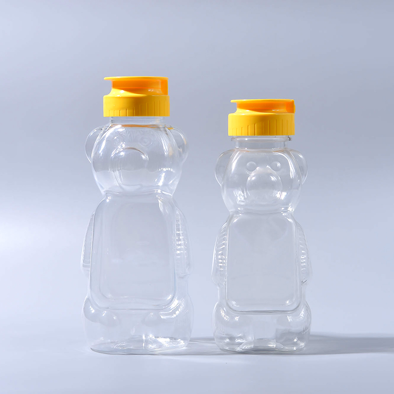 330g Pet Plastic Bear Shape Honey Bottles with Silicone Valve Caps (EF-H03330)