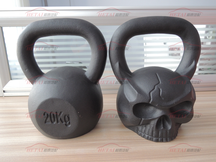 Casting Iron Customized OEM Sculpted Ape Skull Shaped Kettlebell with Face