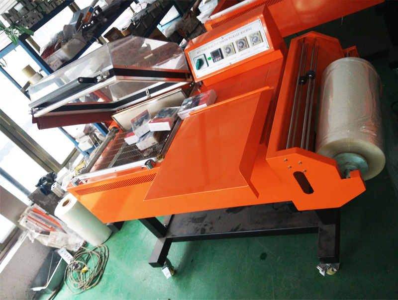 Manual Sealing and Shrining Machine with Semiauto Operation and Cheap Price Conveyor for Thermal Heat PVC Plastic Film Pet Bottle