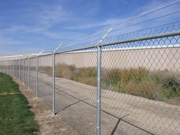 Chain Link Fence with Razor Wire on Top