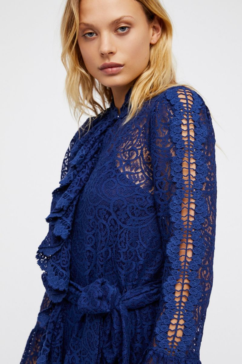 Delicate Sheer Lace Mini Dress Statement Ruffle Detailing Down The Front