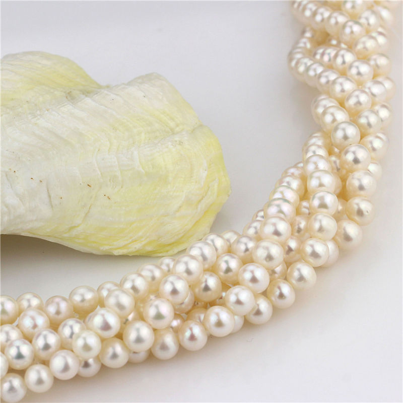 Size 7mm Freshwater Near Round Loose Strand Grade AA White Color Genuine Pearl String