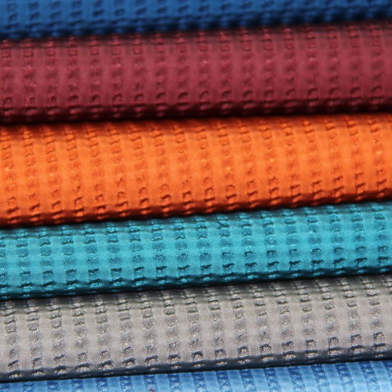 Polyester Jacquard Memory Fabric with Bubble Grid Pattern for Garment