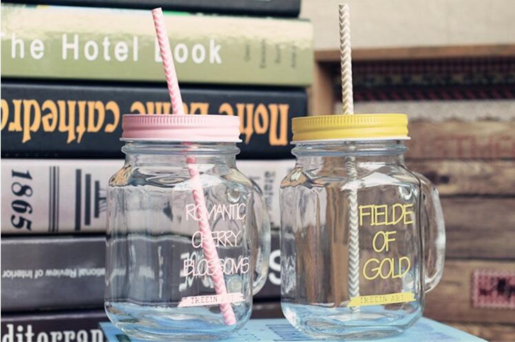 Factory Supply High Flint Decal Custom Logo Glass Mason Jar for Beverage with Beautiful Metal Lid and Straw Wholesale