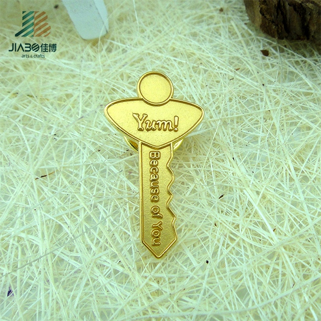 Custom Designed Die Struck Matt Gold Key Shape Pin Badge