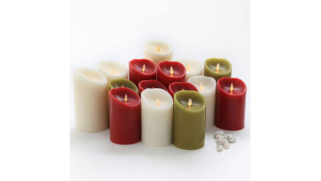 Red color moving wick pillar candles