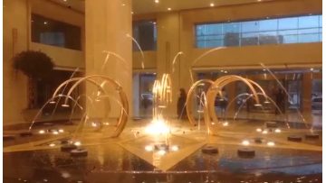 Spring jumping fountain in the hotel lobby