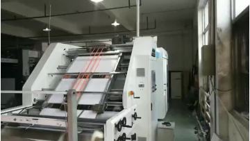 ZGFM1450/zs1450  flute laminator with stacker.mp4