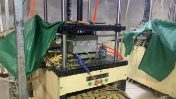 Automated Wax Pressing Machine in Action