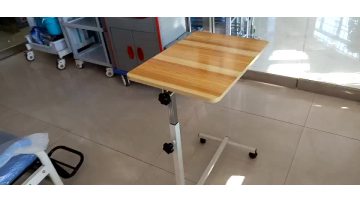 Good quality adjustable height hospital overbed table with wheel1