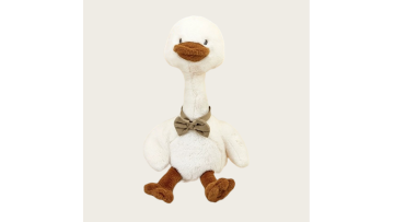 The baby learns to talk to repeat the duck plush t