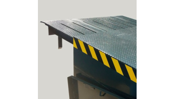 Telesopic dock leveler