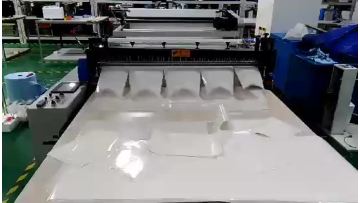 Flying Man brand big size reflective film roll to sheet cross cutting machine.mp4