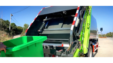 Video of rear mounted garbage compactor