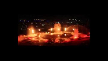 Pulsating water stage performance fire fountain