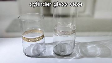 cylinder glass vase with metal decoration