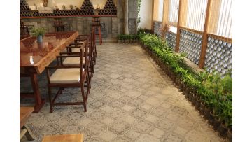 Antique patterned floor tiles