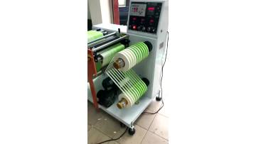 Flying Man brand roll Material Slitting and Rewinding Machine.mp4
