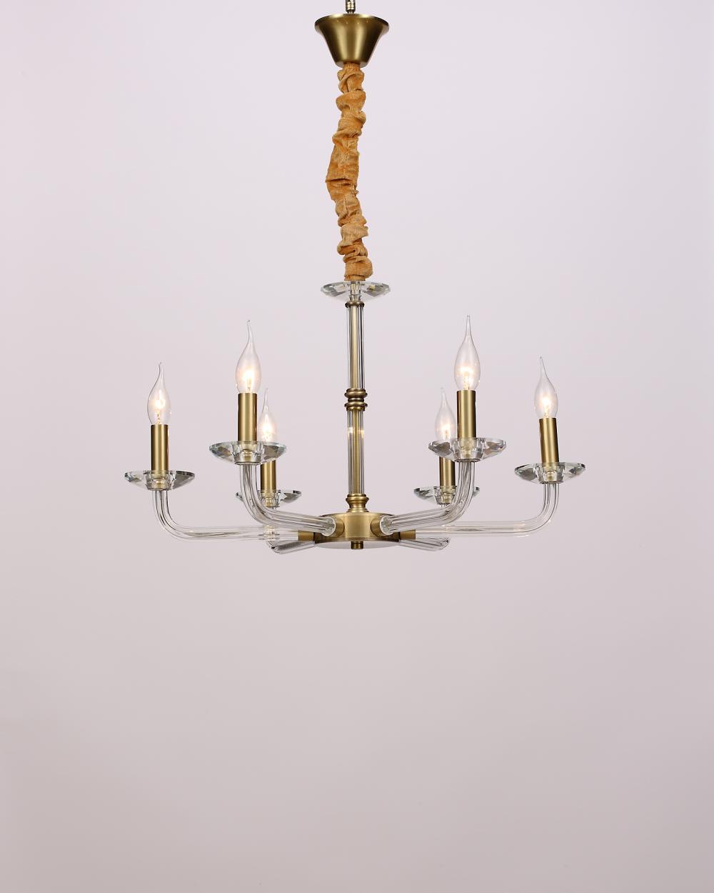 chandelier above dining table