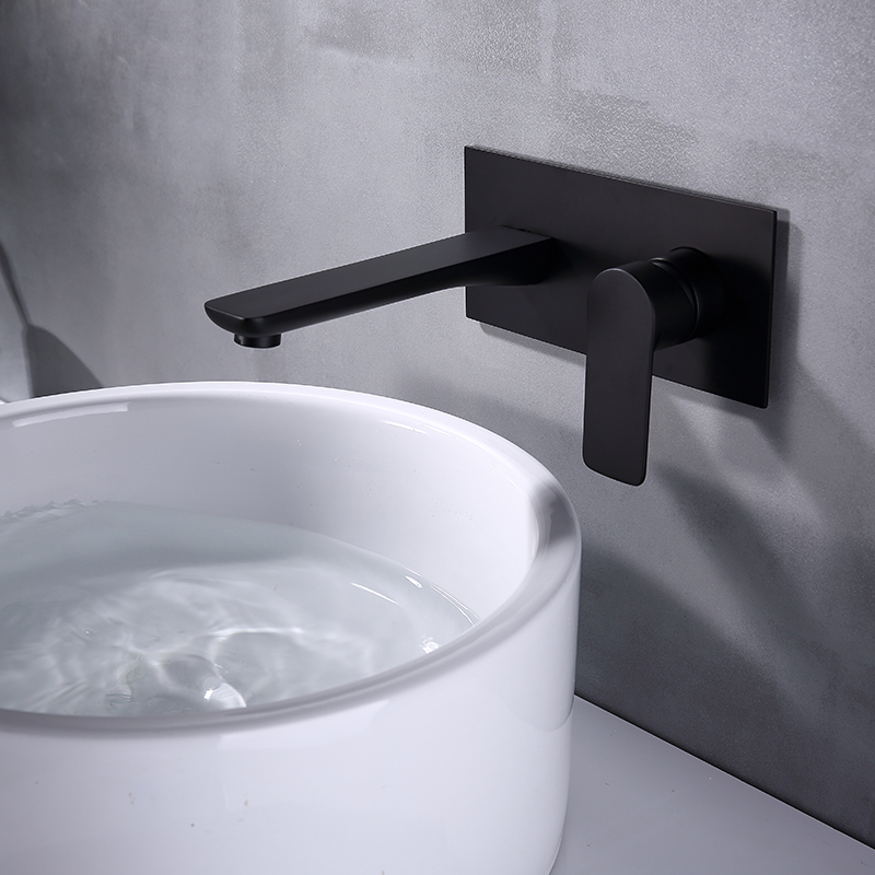 Wall mounted faucet with plate